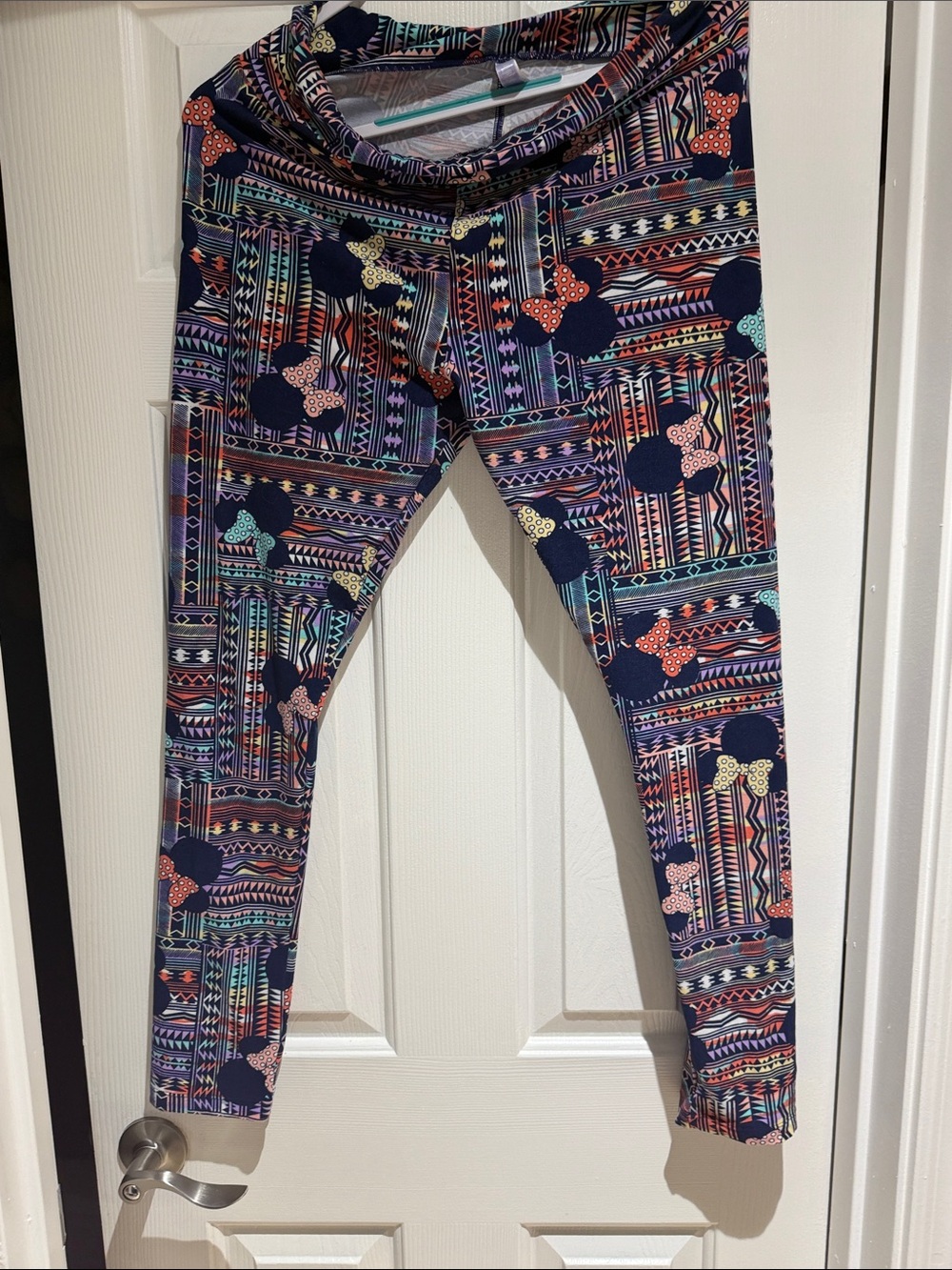 LuLaRoe Navy Leggings with Multicolor Bow and Geometric Print
